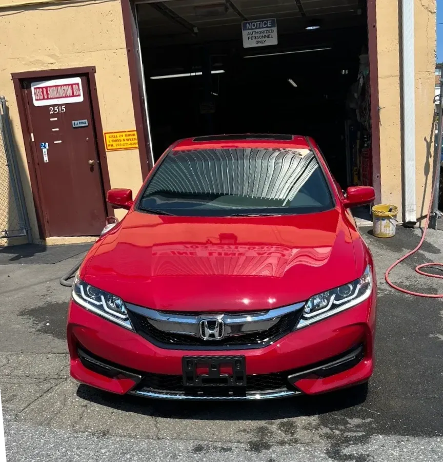 Red Honda after repair