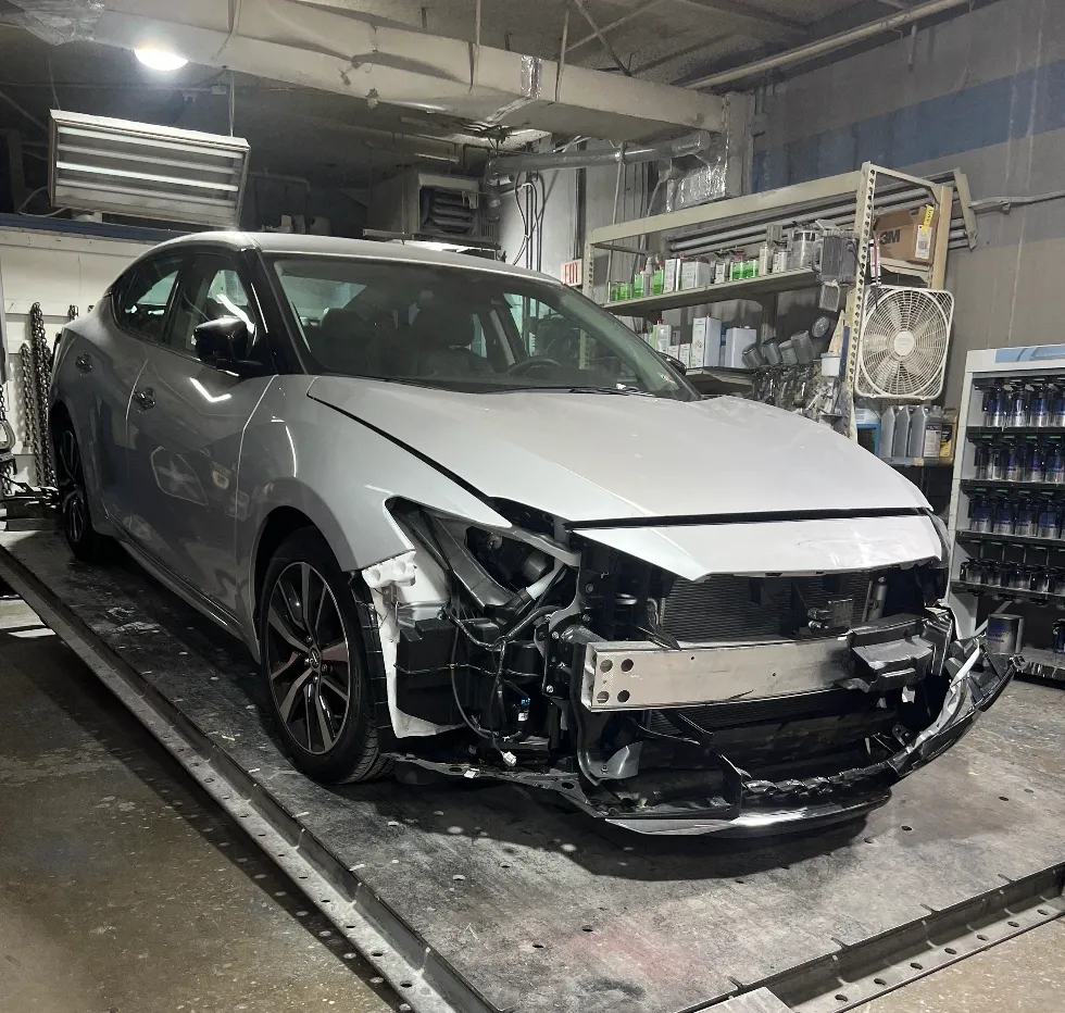 White Nissan before repair